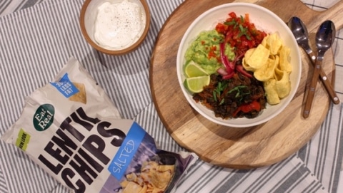 Delicious camping recipe with chickpea tomato, harissa stew and couscous with crispy chip toppings