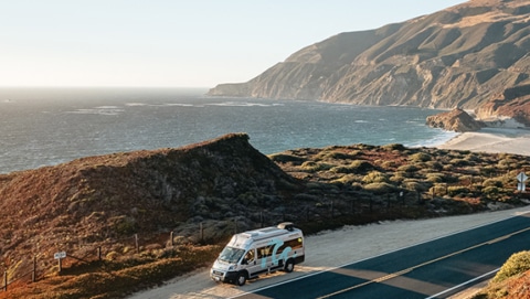 roadsurfer RV camper van parked along Southern California coastline